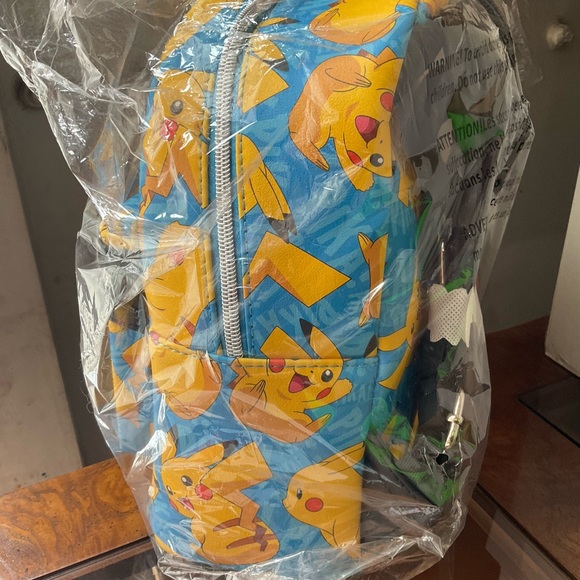 EBGAMES ,LOUNGEFLY EXCLUSIVE PICACHU BACKPACK NWT - Picture 2 of 4